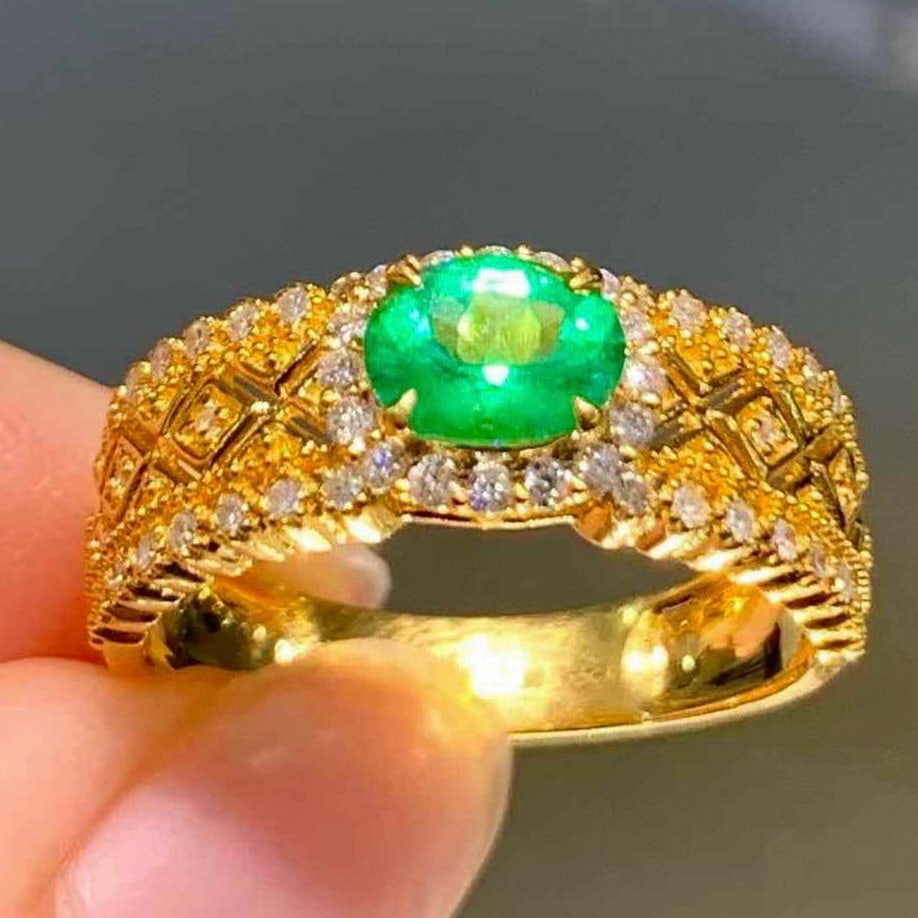 14k Gold 0.65 Ct Natural Emerald & Diamond Ring: Ref:231176450gold // content:14k // goldring // size:7. 25usmain // gemstone:emeraldshape:ovalcarat // weight:0. 65ct // color:greentreatment:naturaladjacent // gemstone // 2 // : //
