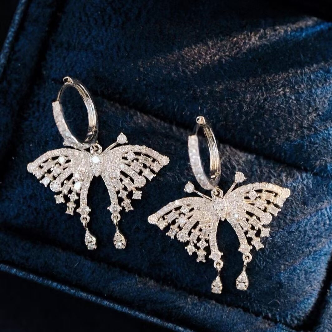 14k Gold 1.36 Ct Natural H Diamond & Butterfly Earrings: Ref:231177010 // gold content:14k gold // main gemstone:diamond // shape:multiple // carat weight:1. 36ct // clarity grade:vs-si // color:h // treatment:natural // High Estimate: 5300 Low Estimate: