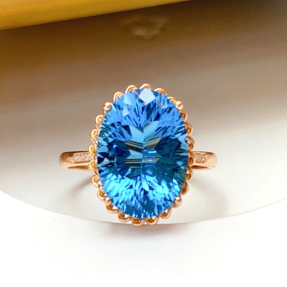 14k Gold 7.50 Ct Natural Topaz & Diamond Ring: Ref:231177058 // gold content:14k gold // ring size:7. 25us // // main gemstone:topaz // shape:oval // carat weight:7. 50ct // color:blue // treatment:natural // // adjacent gemstone 2 : diamond //