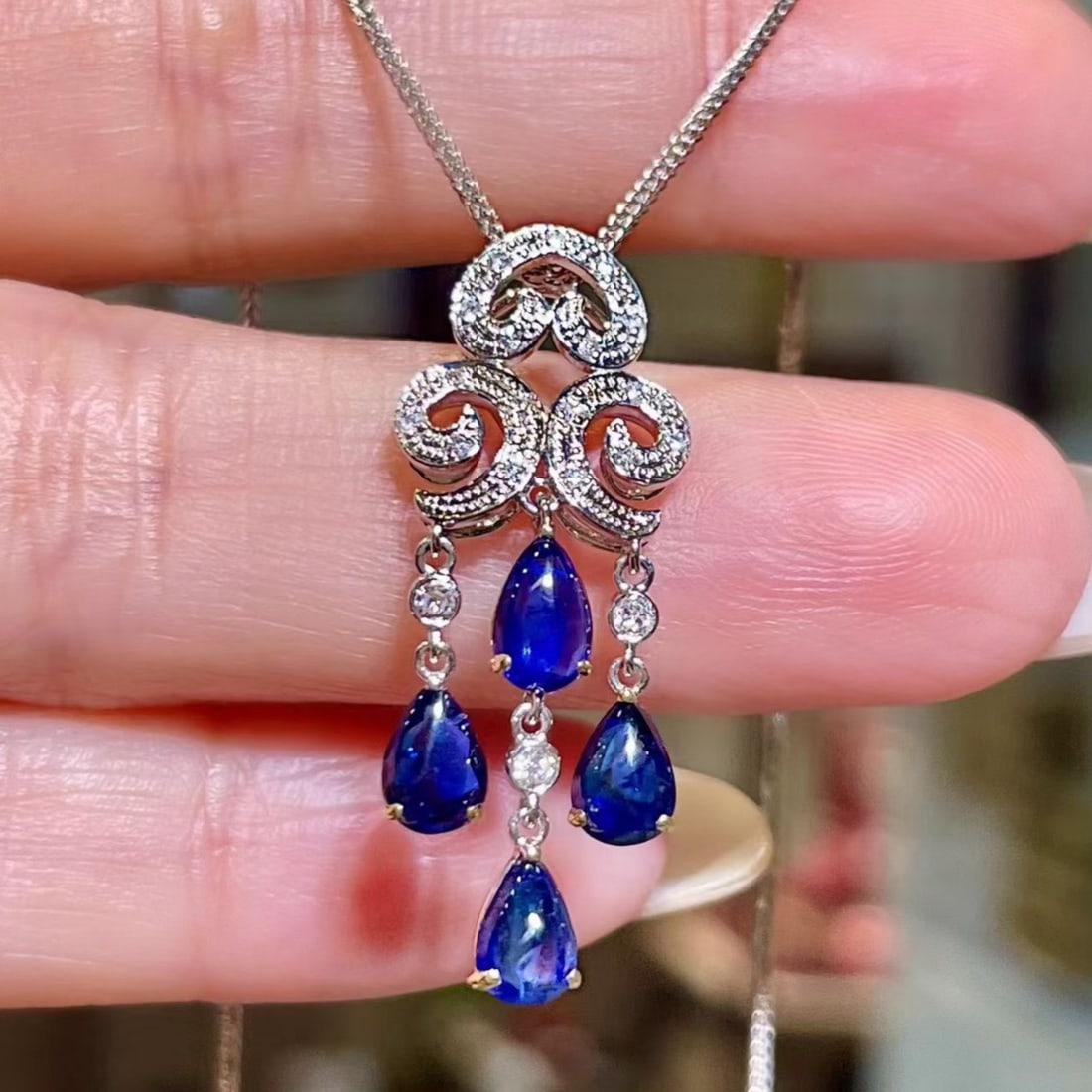 14k Gold 1.82 Ctw Natural Sapphire & Diamond Pendant( Without Chain ): Ref:231177087 // gold content:14k gold // main gemstone:sapphire // number of stones:4 // shape:pear // carat weight:1. 71ct // color:blue // treatment:natural // // adjacent gemstone 2 : diamond //