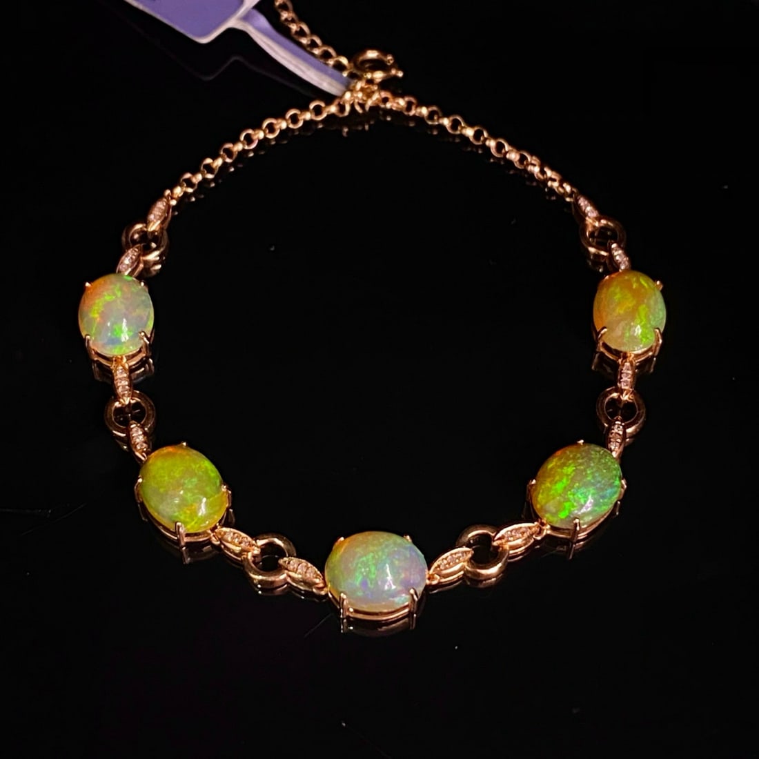 14k Gold 6.05 Ct Natural Opal & Diamond Bracelet: Ref:231177092 // gold content:14k gold // main gemstone:opal // number of stones:5 // shape:oval // carat weight:6. 05ct // color:white // treatment:natural // // adjacent gemstone 2 : diamond //
