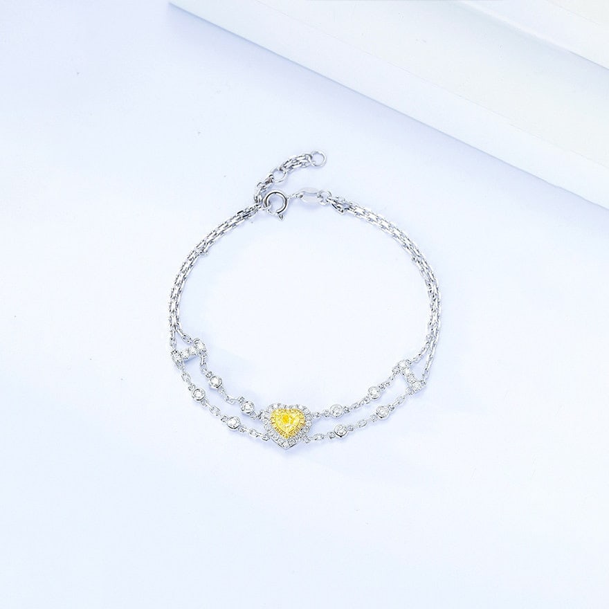 14k Gold 0.70 Ctw Natural Yellow Diamond & Diamond Bracelet: Ref:231177102 // gold content:14k gold // main gemstone:yellow diamond // shape:heart // carat weight:0. 30ct // color:yellow // treatment:natural // // adjacent gemstone 2 : diamond // shape:round