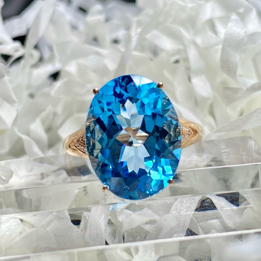 14k Gold 9.25 Ct Natural Topaz & Diamond Ring: Ref:231177107 // gold content:14k gold // ring size:7. 25us // // main gemstone:topaz // shape:oval // carat weight:9. 25ct // color:blue // treatment:natural // // adjacent gemstone 2 : diamond //