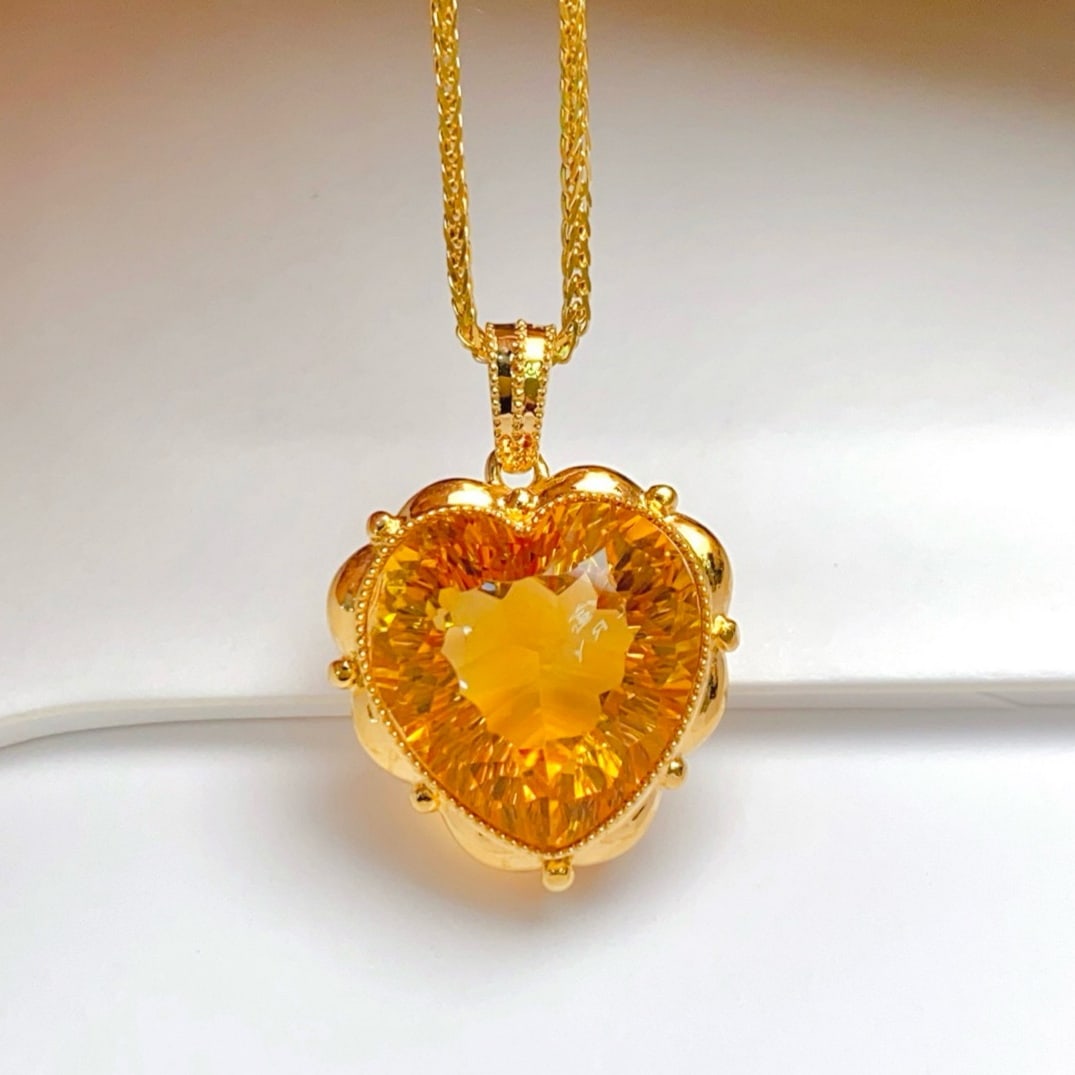 14k Gold 8.80 Ct Natural Citrine Pendant( Without Chain ): Ref:231177170 // gold content:14k gold // main gemstone:citrine // shape:heart // carat weight:8. 80ct // color:yellow // treatment:natural // Condition: New High Estimate: 2800 Low Estimate: 1900