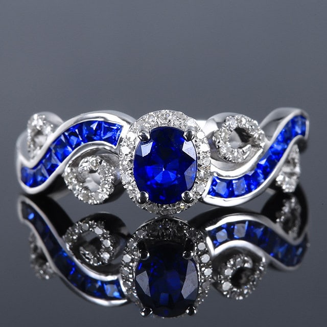 14k Gold 1.10 Ctw Natural Sapphire & Sapphire Ring: Ref:231177232 // gold content:14k gold // ring size:7. 25us // // main gemstone:sapphire // shape:oval // carat weight:0. 58ct // color:blue // treatment:natural // // adjacent gemstone 2 : sapphire