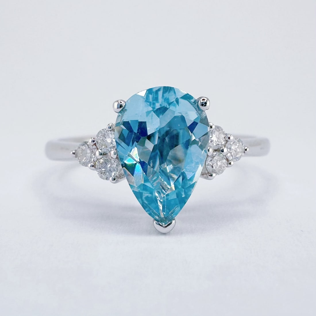 14k Gold 1.12 Ctw Natural Aquamarine & Diamond Ring: Ref:231178009 // gold content:14k gold // ring size:7. 25us // // main gemstone:aquamarine // shape:pear // carat weight:1. 00ct // color:blue // treatment:natural // // adjacent gemstone 2 : diamond