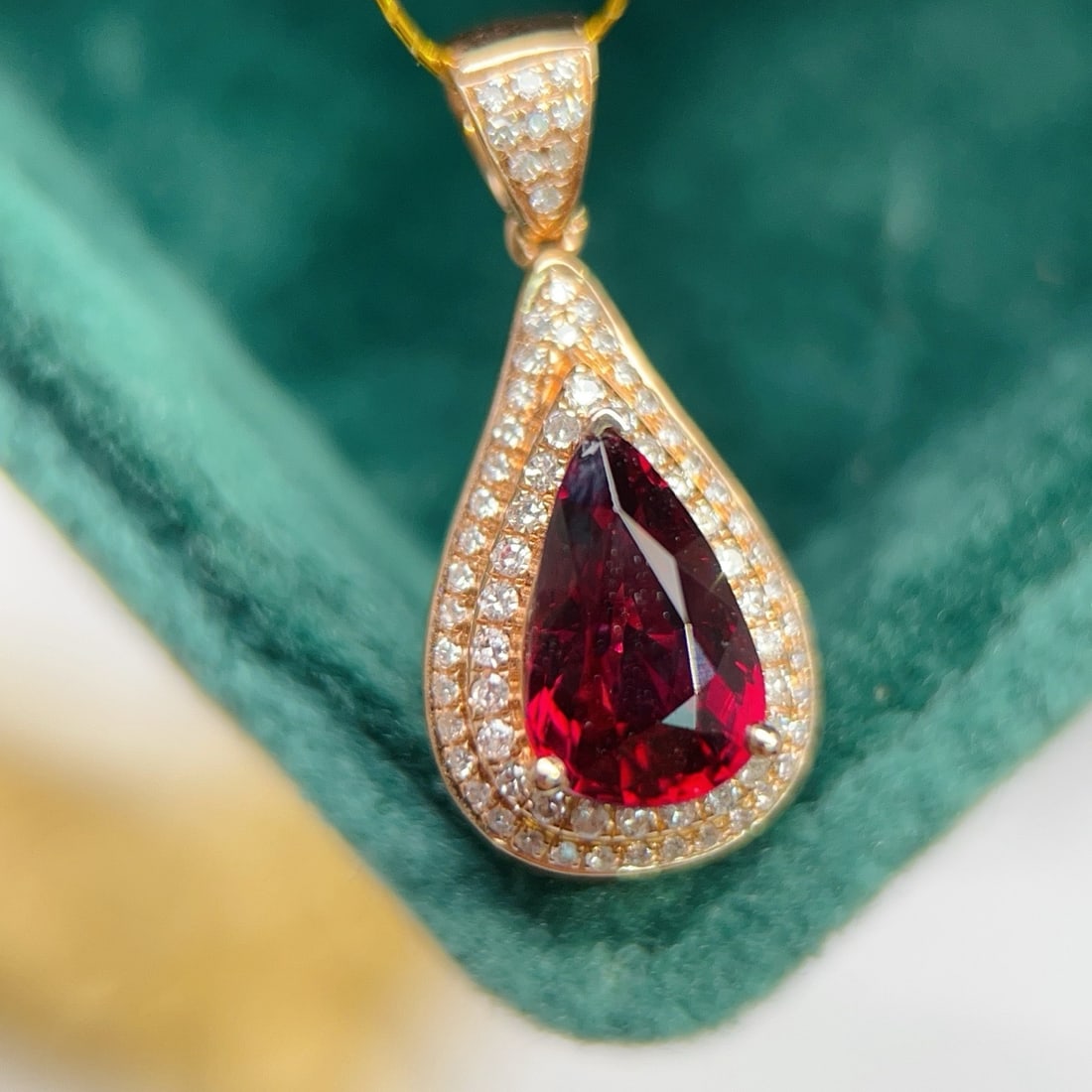 14k Gold 1.89 Ctw Natural Tourmaline & Diamond Pendant( Without Chain ): Ref:231178054 // gold content:14k gold // main gemstone:tourmaline // shape:pear // carat weight:1. 6ct // color:red // treatment:natural // // adjacent gemstone 2 : diamond // number of stones:78 //