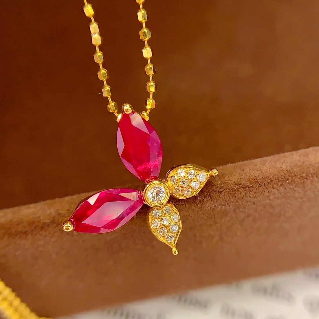 14k Gold 1.45 Ct Natural Ruby & Diamond Pendant( Without Chain ): Ref:231178082 // gold content:14k gold // main gemstone:ruby // shape:marquise // carat weight:1. 45ct // color:red // treatment:natural // // adjacent gemstone 2 : diamond // number of stones:16 //