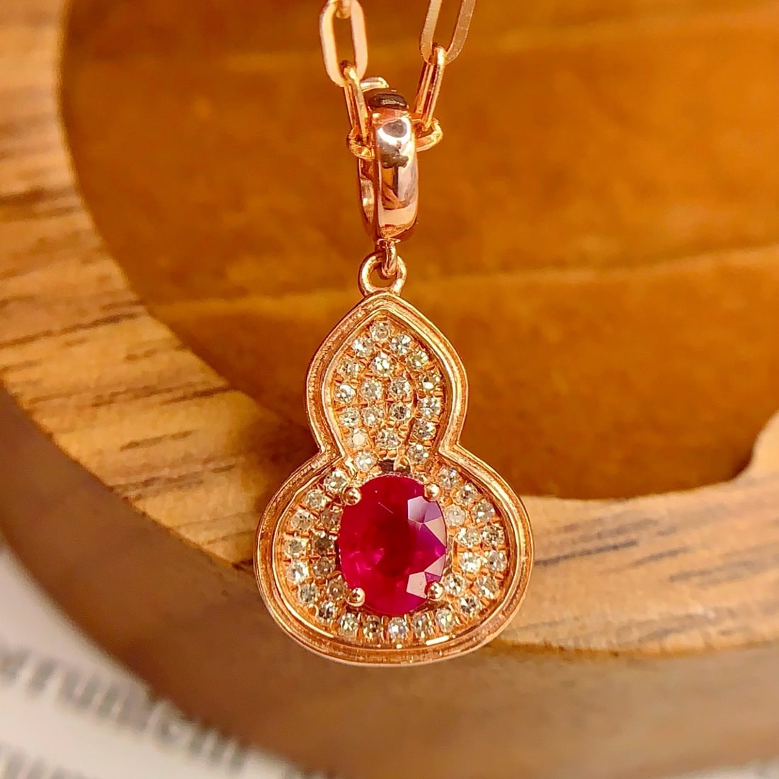 14k Gold 0.5 Ct Natural Ruby & Diamond Pendant( Without Chain ): Ref:231178103 // gold content:14k gold // main gemstone:ruby // shape:oval // carat weight:0. 5ct // color:red // treatment:natural // // adjacent gemstone 2 : diamond // number of stones:46 //