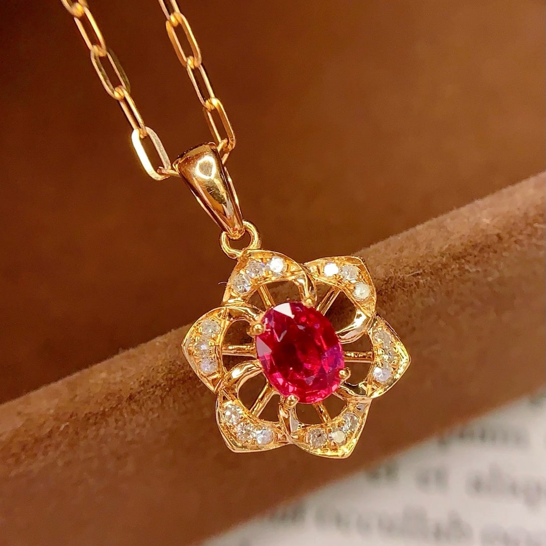 14k Gold 0.7 Ct Natural Ruby & Diamond Pendant( Without Chain ): Ref:231178112 // gold content:14k gold // main gemstone:ruby // shape:oval // carat weight:0. 7ct // color:red // treatment:natural // // adjacent gemstone 2 : diamond // number of stones:18 //