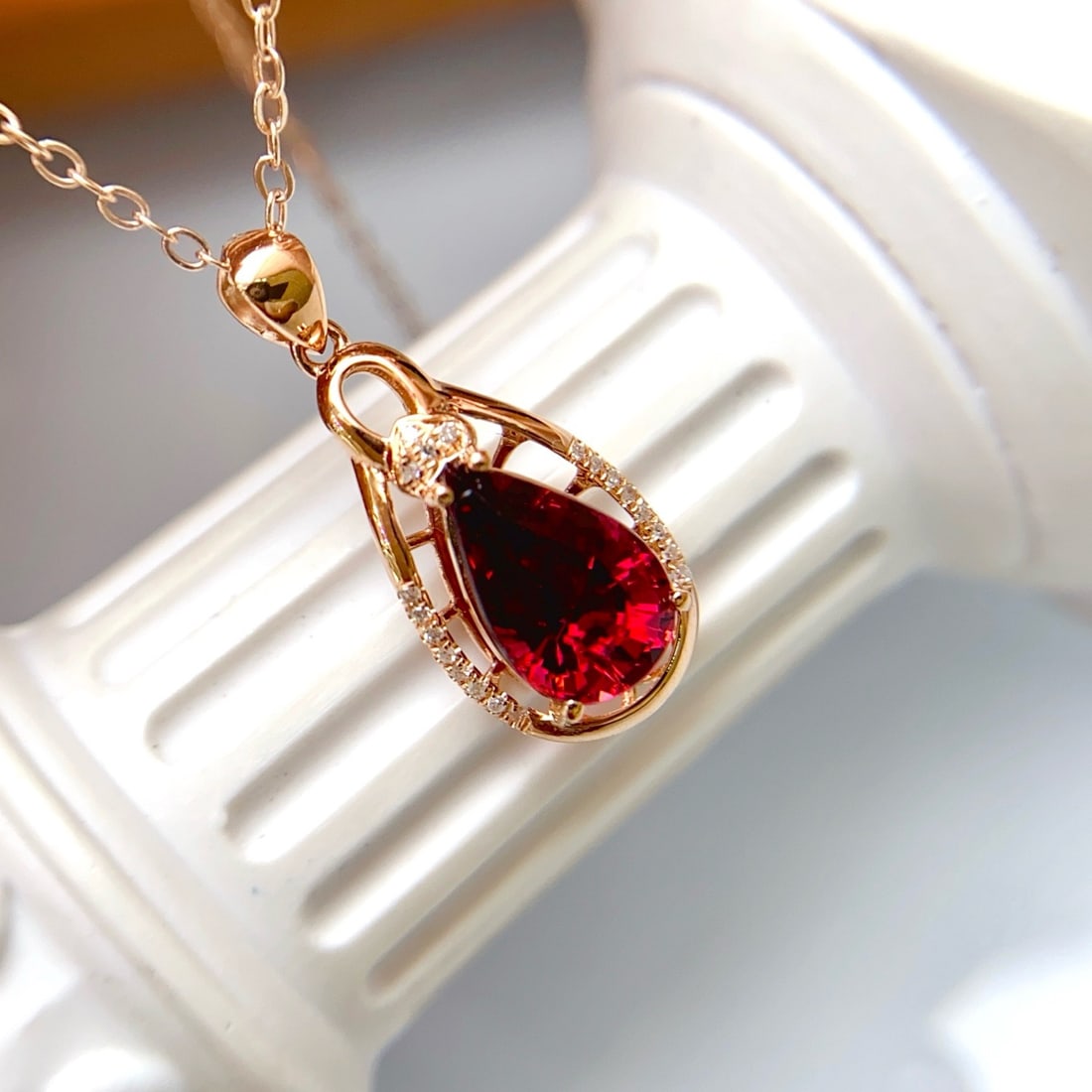14k Gold 1.48 Ct Natural Tourmaline & Diamond Pendant( Without Chain ): Ref:231178120 // gold content:14k gold // main gemstone:tourmaline // shape:pear // carat weight:1. 48ct // color:red // treatment:natural // // adjacent gemstone 2 : diamond // number of stones:20
