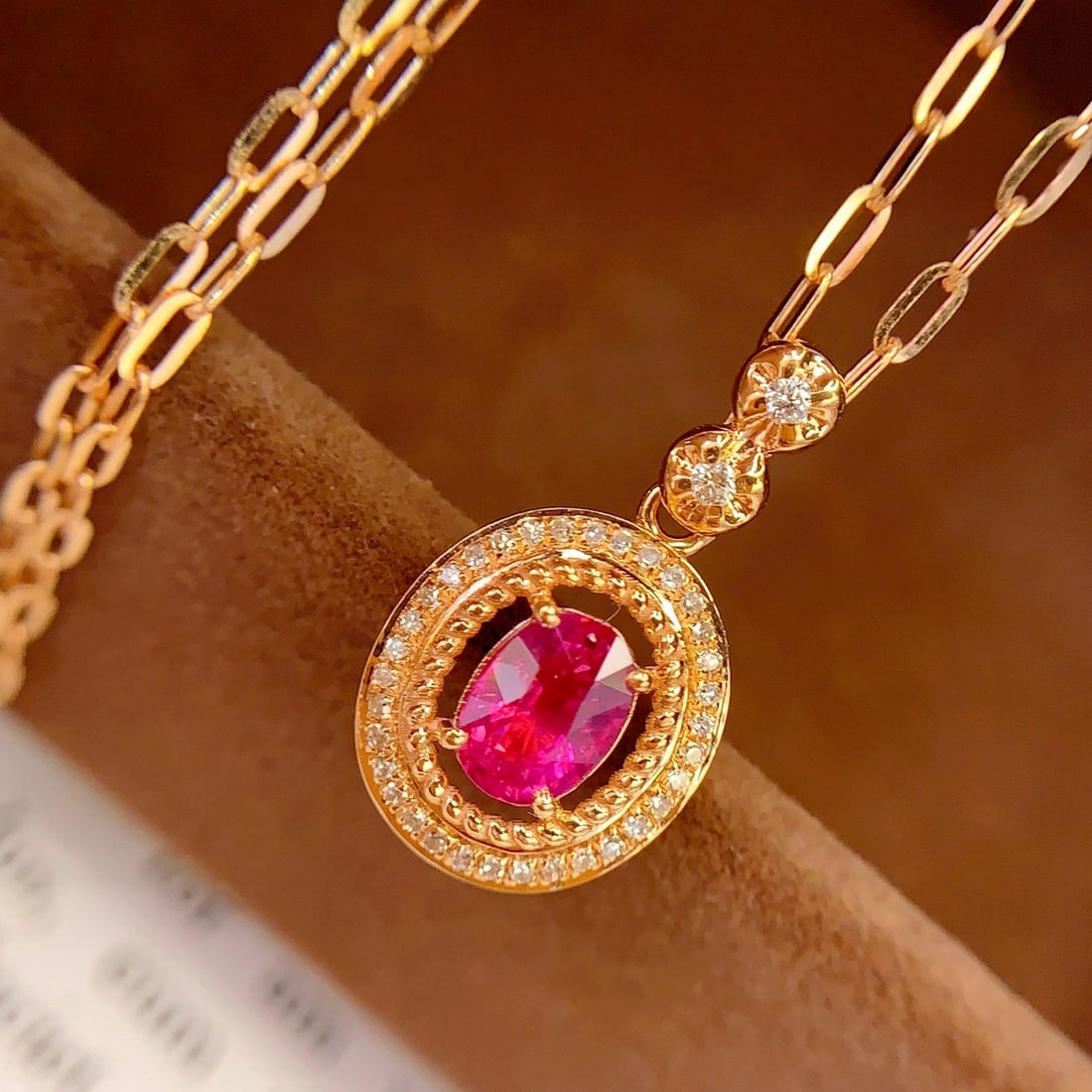 14k Gold 0.7 Ct Natural Ruby & Diamond Pendant( Without Chain ): Ref:231178127 // gold content:14k gold // main gemstone:ruby // shape:oval // carat weight:0. 7ct // color:red // treatment:natural // // adjacent gemstone 2 : diamond // number of stones:36 //