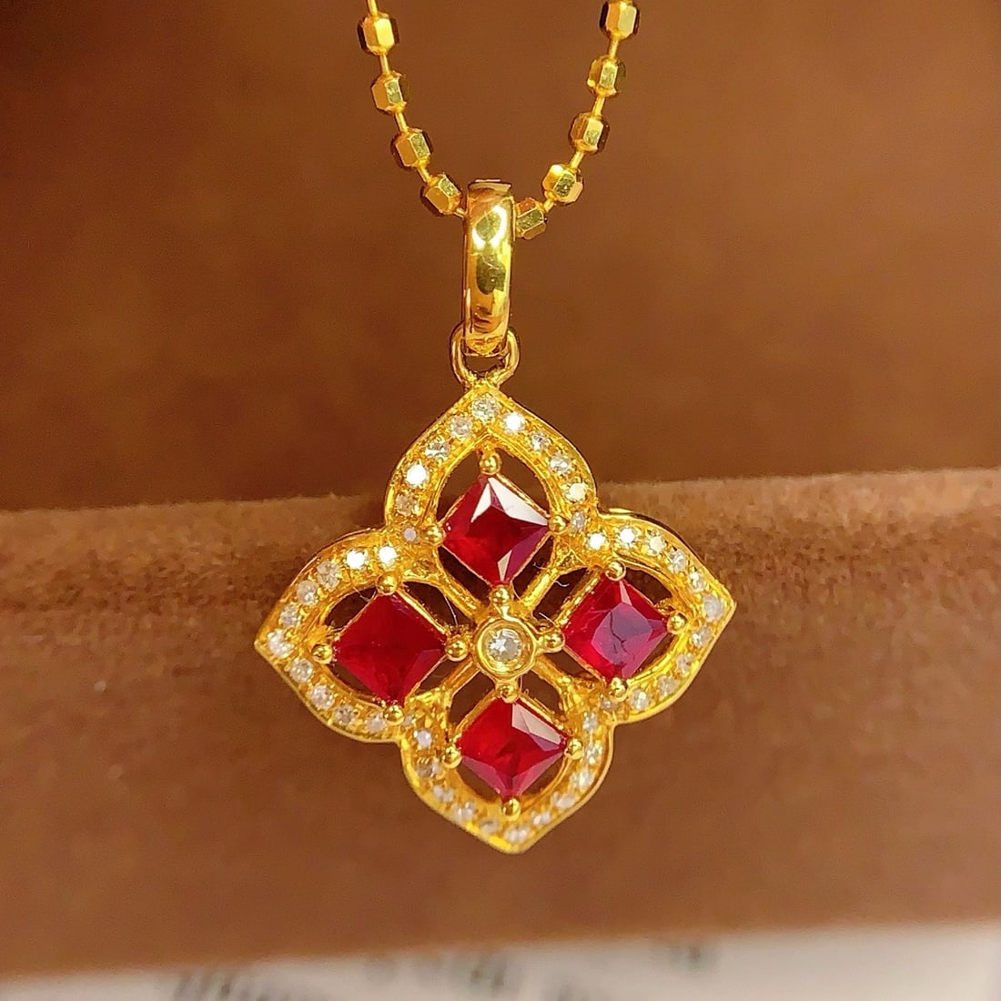 14k Gold 0.6 Ct Natural Ruby & Diamond Pendant( Without Chain ): Ref:231178132 // gold content:14k gold // main gemstone:ruby // shape:princess // carat weight:0. 6ct // color:red // treatment:natural // // adjacent gemstone 2 : diamond // number of stones:45 //