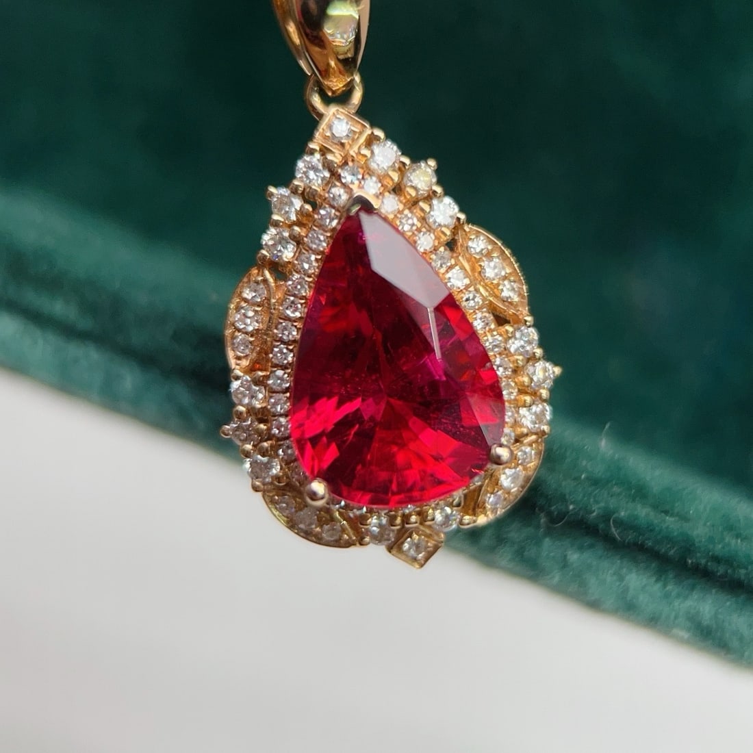 14k Gold 3.06 Ctw Natural Tourmaline & Diamond Pendant( Without Chain ): Ref:231178167 // gold content:14k gold // main gemstone:tourmaline // shape:pear // carat weight:2. 75ct // color:red // treatment:natural // // adjacent gemstone 2 : diamond // number of stones:68