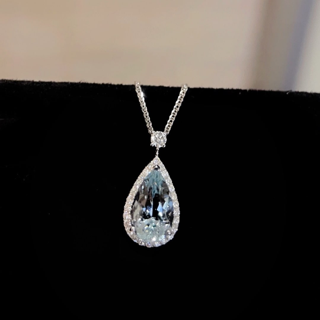 14k Gold 1.7 Ctw Natural Aquamarine & Diamond Pendant( Without Chain ): Ref:231178183 // gold content:14k gold // main gemstone:aquamarine // shape:pear // carat weight:1. 5ct // color:blue // treatment:natural // // adjacent gemstone 2 : diamond // shape:round // carat