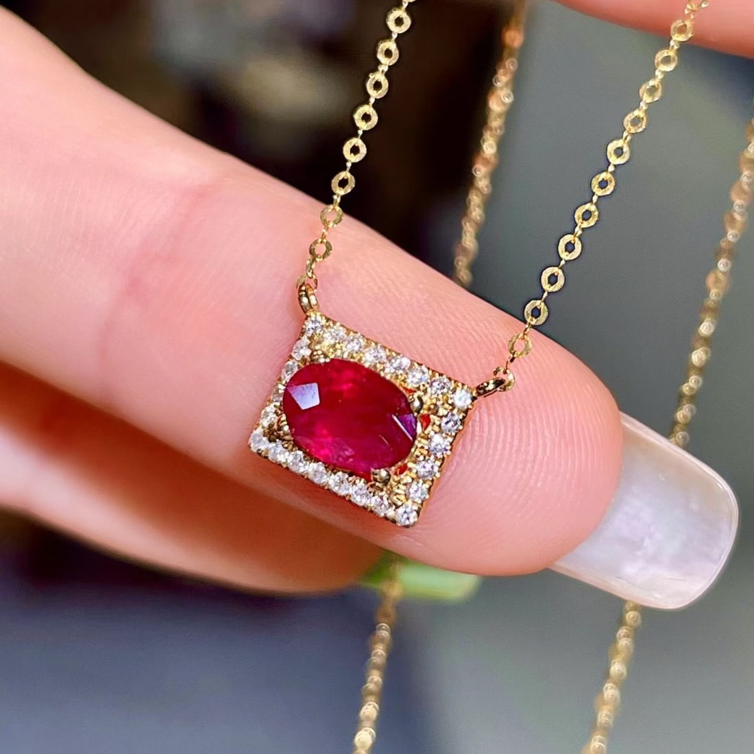 14k Gold 0.82 Ctw Vivid Red Natural Ruby & Diamond Necklace: Ref:231178210 // gold content:14k gold // main gemstone:ruby // shape:oval // carat weight:0. 70ct // color:vivid red // treatment:natural // // adjacent gemstone 2 : diamond // shape:round // carat