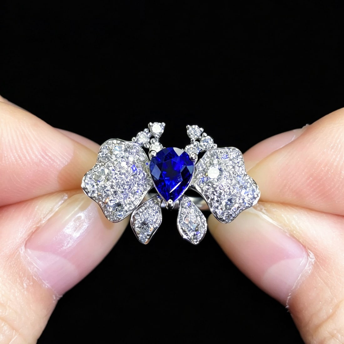 14k Gold 1.66 Ctw Natural Sapphire & Diamond Ring: Ref:231178212 // gold content:14k gold // ring size:7. 25us // // main gemstone:sapphire // shape:pear // carat weight:1. 05ct // color:royal blue // treatment:natural // // adjacent gemstone 2 :