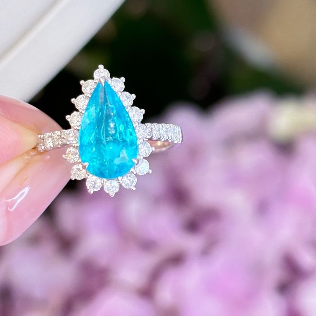 14k Gold 1.57 Ct Natural Paraiba Tourmaline & Diamond Ring: Ref:231178262 // gold content:14k gold // ring size:7. 25us // // main gemstone:paraiba tourmaline // shape:pear // carat weight:1. 57ct // color:blue // treatment:natural // // adjacent gemstone 2 :