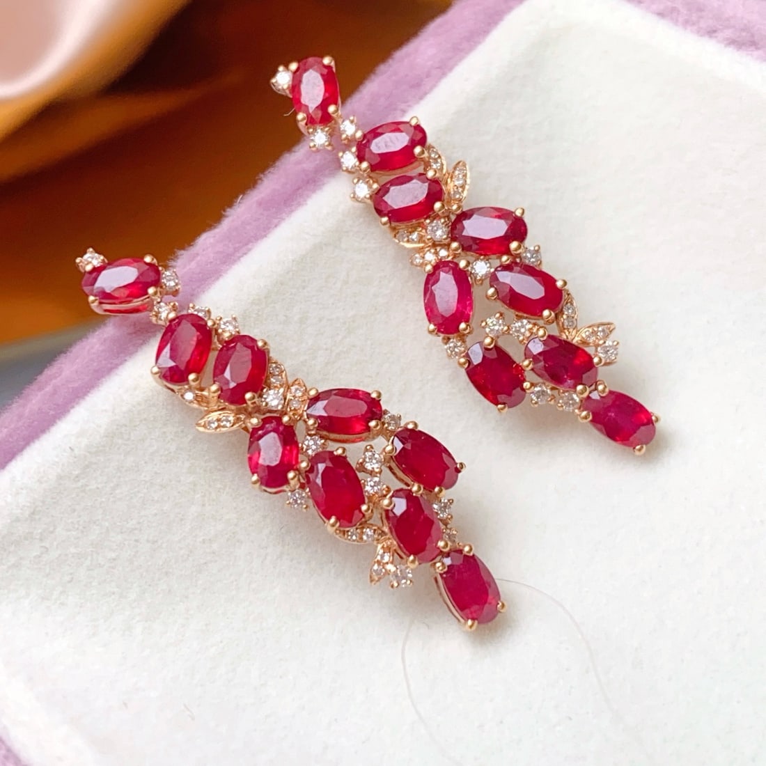 14k Gold 5.95 Ct Natural Ruby & Diamond Earrings: Ref:231178270 // gold content:14k gold // main gemstone:ruby // shape:oval // carat weight:5. 95ct // color:red // treatment:natural // // adjacent gemstone 2 : diamond // number of stones:56 //
