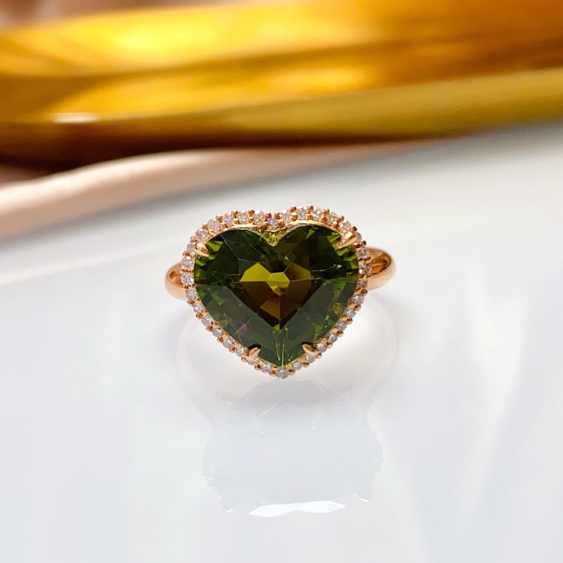 14k Gold 5.55 Ct Natural Tourmaline & Diamond Ring: Ref:231178272 // gold content:14k gold // ring size:7. 25us // // main gemstone:tourmaline // shape:heart // carat weight:5. 55ct // color:green // treatment:natural // // adjacent gemstone 2 : diamon