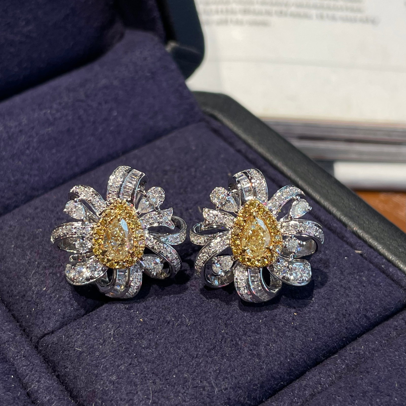 14k Gold 1.33 Ctw Natural Yellow Diamond & Diamond Earrings: Ref:231178304 // gold content:14k gold // main gemstone:yellow diamond // shape:pear // carat weight:0. 55ct // color:yellow // treatment:natural // // adjacent gemstone 2 : diamond // shape:multiple 