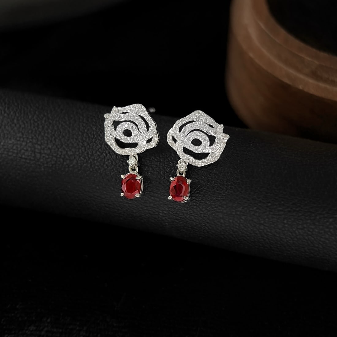 14k Gold 0.5 Ct Natural Ruby & Diamond Earrings: Ref:231178364 // gold content:14k gold // main gemstone:ruby & diamond // shape:oval & round // carat weight:0. 5ct // color:red & white // treatment:natural // High Estimate: 3100 Low Estimate: 2100