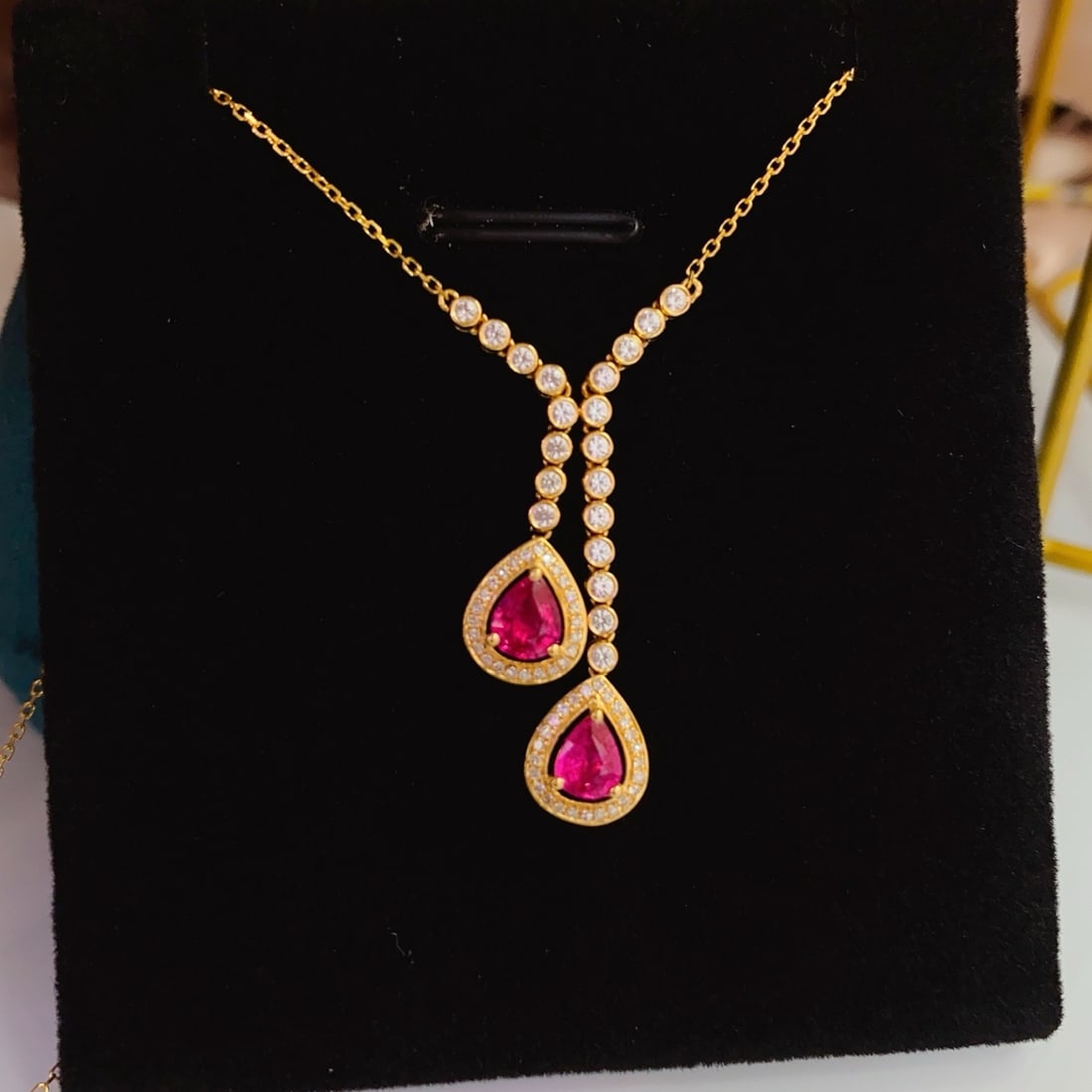 14k Gold 1.00 Ct Natural Ruby & Diamond & Sapphire Necklace: Ref:231178375 // gold content:14k gold // main gemstone:ruby // shape:pear // carat weight:1. 00ct // color:red // treatment:natural // // adjacent gemstone 2 : diamond // number of stones:48 //