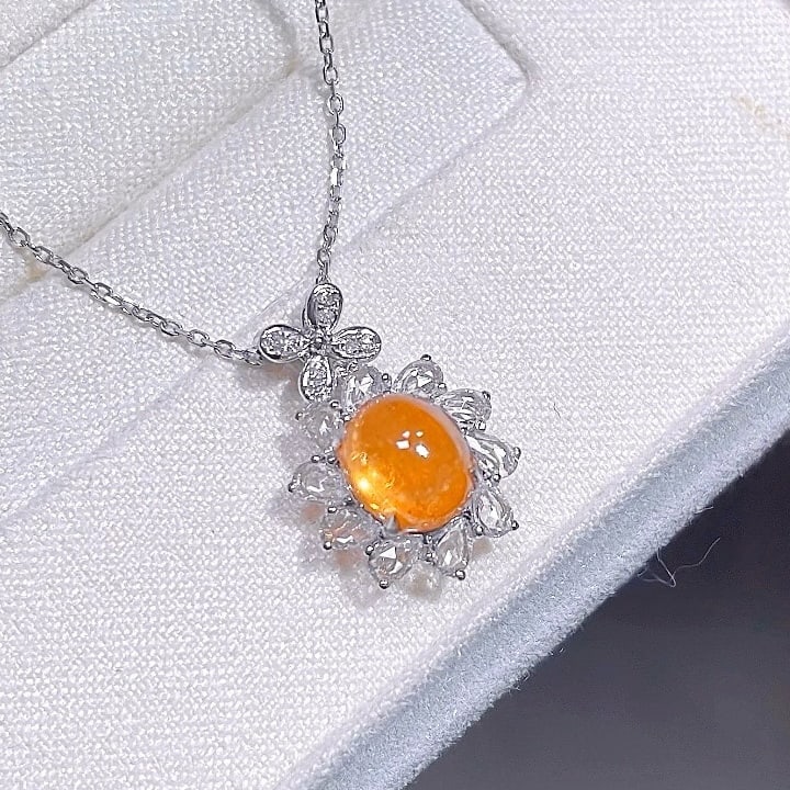 14k Gold 2.71 Ctw Natural Spessartine & Sapphire Pendant( Without Chain ): Ref:231178397 // gold content:14k gold // main gemstone:spessartine // shape:oval // carat weight:2. 18ct // color:orange // treatment:natural // // adjacent gemstone 2 : sapphire // shape:pear //