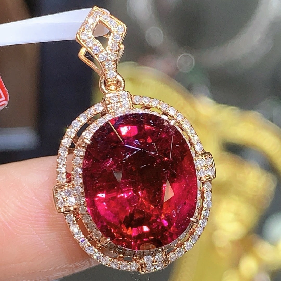 14k Gold 8.04 Ct Natural Tourmaline & Diamond Pendant( Without Chain ): Ref:231179069 // gold content:14k gold // main gemstone:tourmaline // shape:oval // carat weight:8. 04ct // color:red // treatment:natural // // adjacent gemstone 2 : diamond // number of stones:111