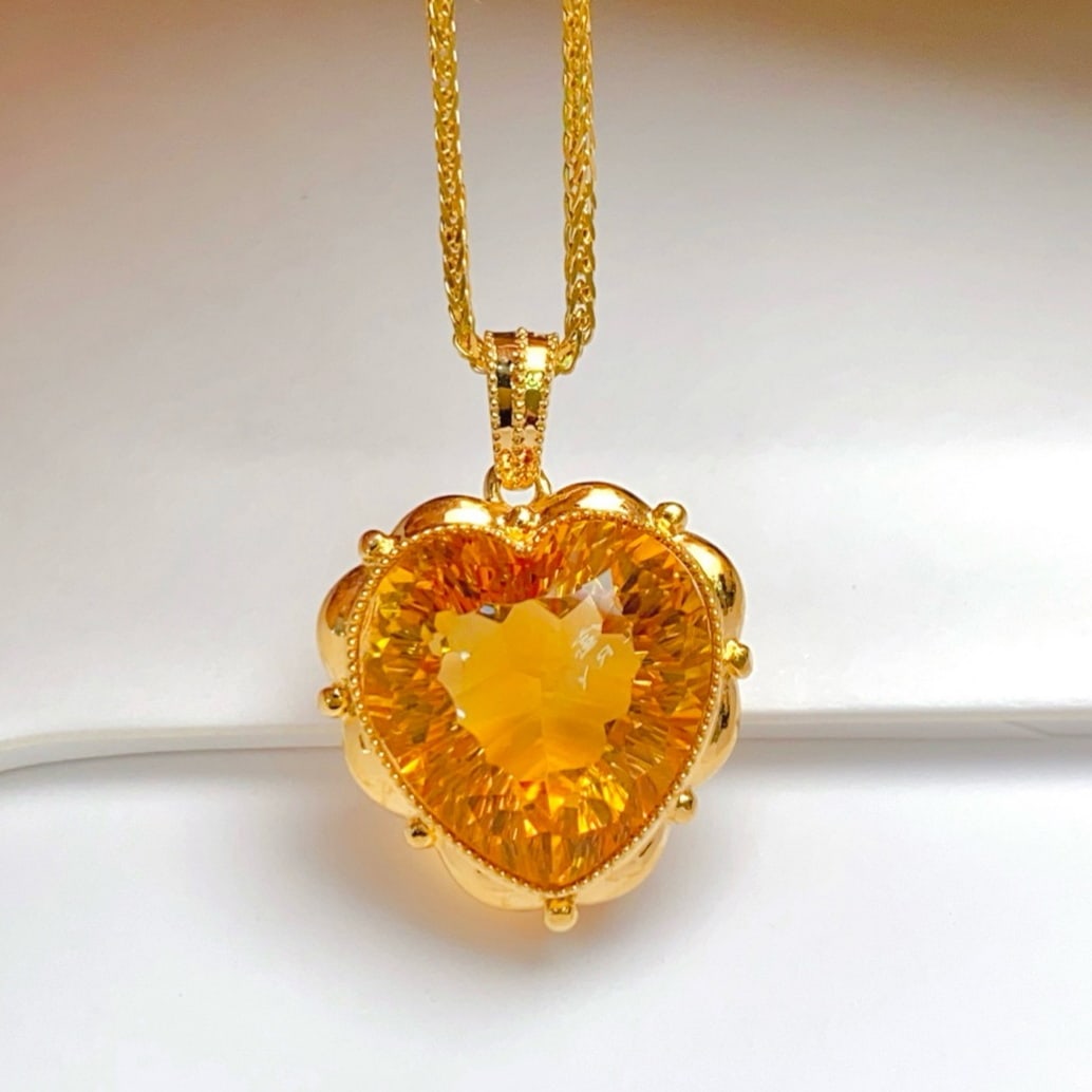 14k Gold 8.80 Ct Natural Citrine Pendant( Without Chain ): Ref:231179075 // gold content:14k gold // main gemstone:citrine // shape:heart // carat weight:8. 80ct // color:yellow // treatment:natural // Condition: New Low Estimate: 2100.00 High Estimate: