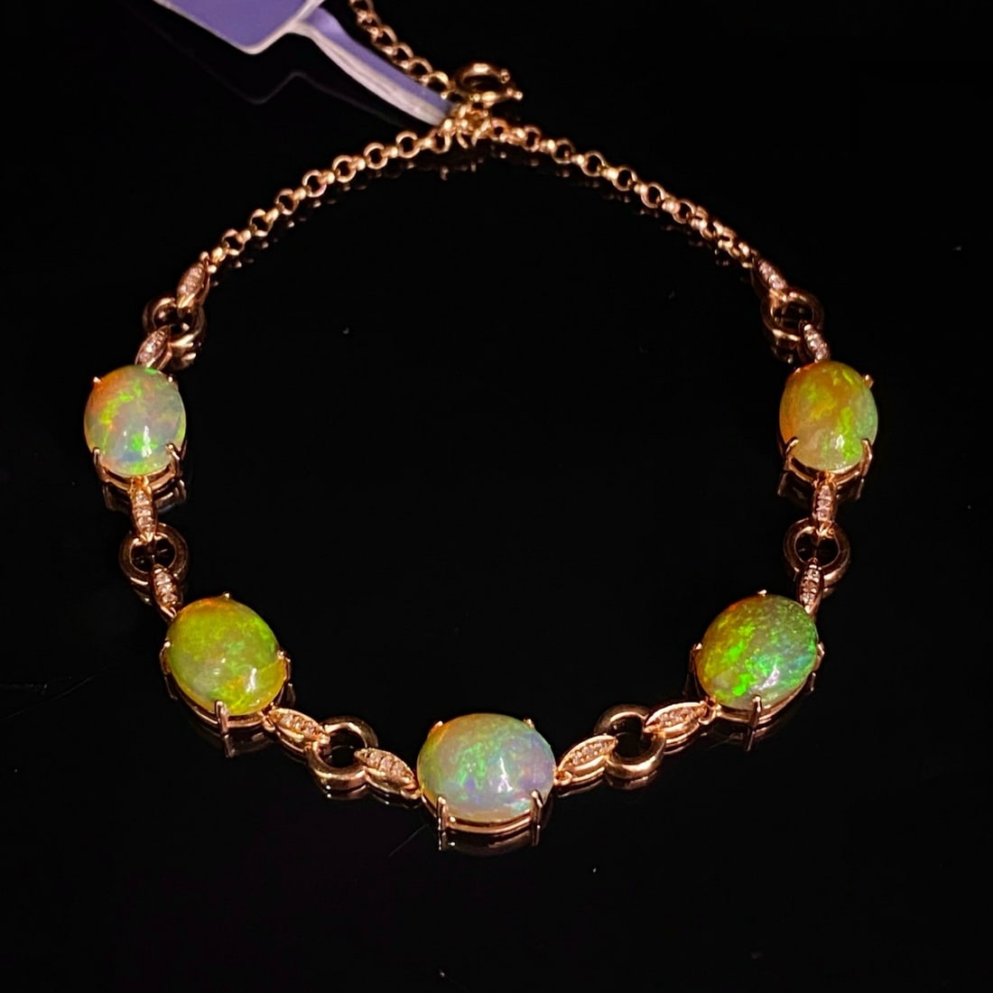 14k Gold 6.05 Ct Natural Opal & Diamond Bracelet: Ref:231179143 // gold content:14k gold // main gemstone:opal // shape:oval // carat weight:6. 05ct // color:color // treatment:natural // // adjacent gemstone 2 : diamond // number of stones:36 //