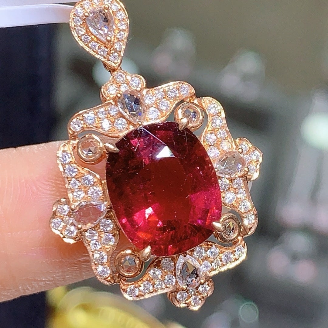 14k Gold 5.2 Ct Natural Tourmaline & Diamond & Sapphire Pendant( Without Chain ): Ref:231179221 // gold content:14k gold // main gemstone:tourmaline // shape:cushion // carat weight:5. 2ct // color:red // treatment:natural // // adjacent gemstone 2 : diamond // number of stones:79