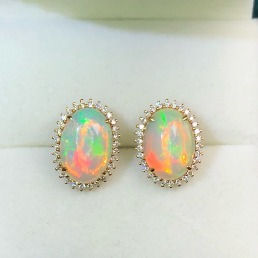 14k Gold 3.0 Ct Natural Opal & Diamond Earrings: Ref:231179239 // gold content:14k gold // main gemstone:opal // shape:oval // carat weight:3. 0ct // color:color // treatment:natural // // adjacent gemstone 2 : diamond // shape:round // clarity