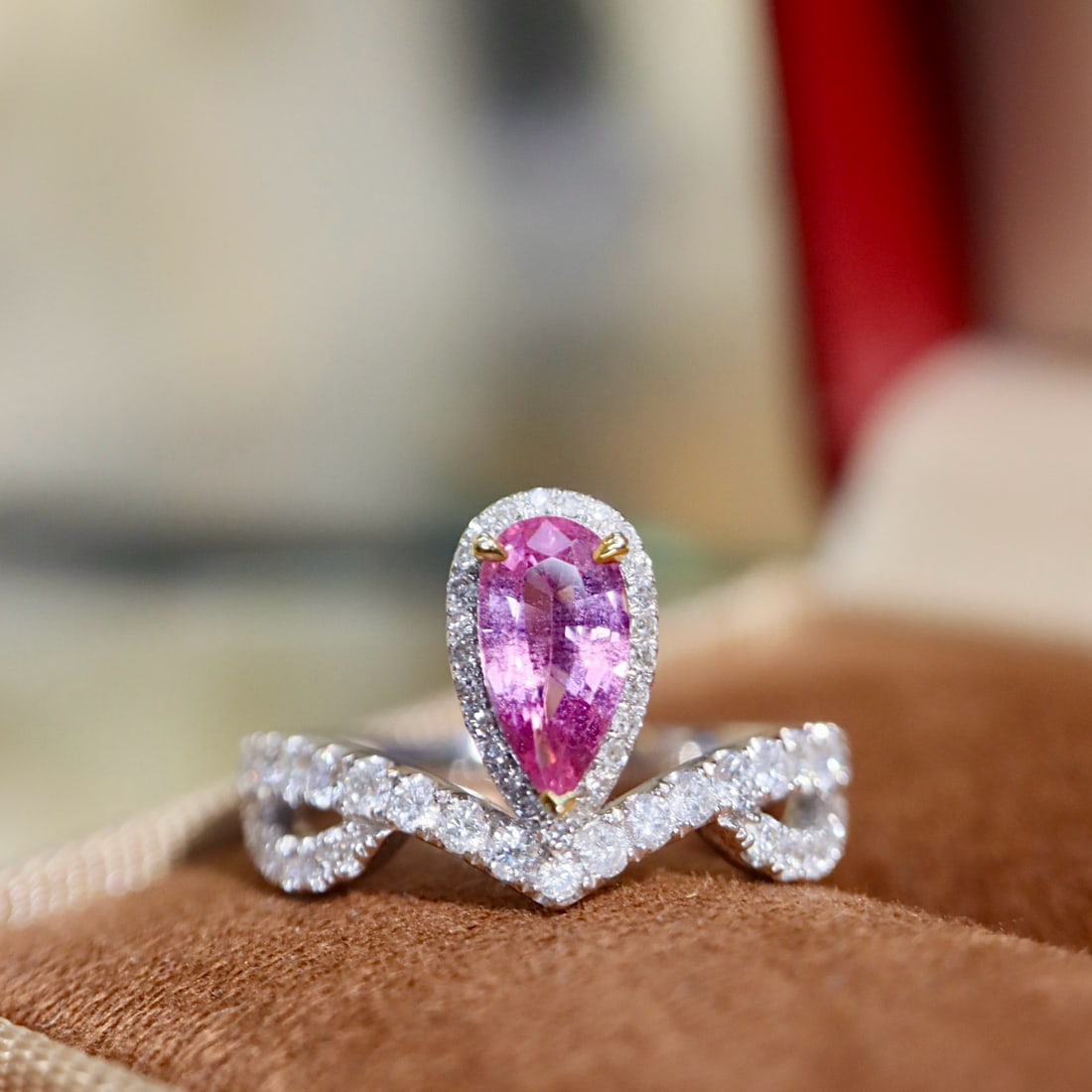 14k Gold 1.18 Ctw Natural Padparadscha Sapphire & Diamond Ring: Ref:231180022 // gold content:14k gold // ring size:7. 25us // // main gemstone:padparadscha sapphire // shape:pear // carat weight:0. 82ct // color:orangish pink // treatment:natural // // adjacent