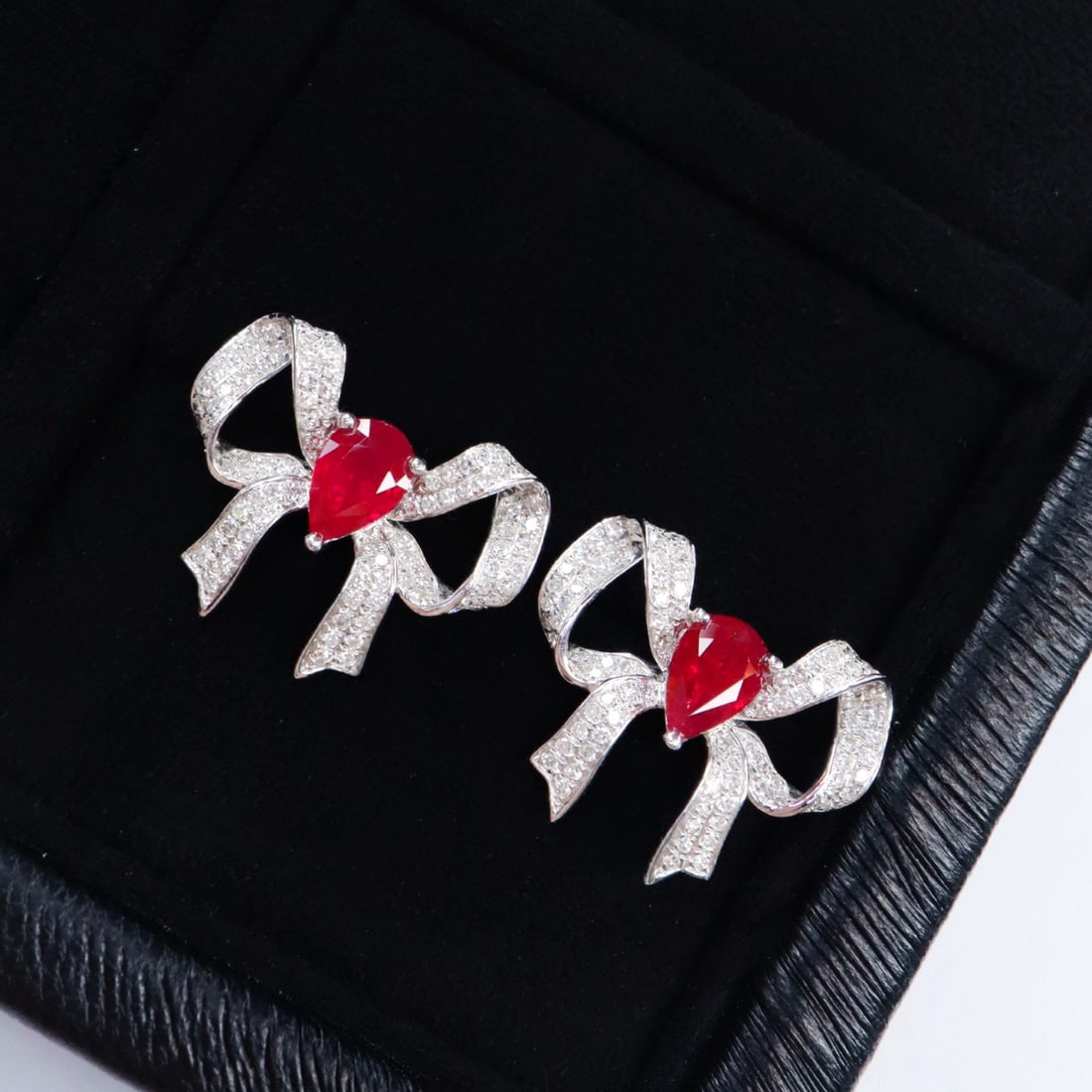 14k Gold 1.70 Ctw Natural Ruby & Diamond Earrings: Ref:231180029 // gold content:14k gold // main gemstone:ruby // shape:pear // carat weight:1. 18ct // color:pigeonblood red // treatment:natural // // adjacent gemstone 2 : diamond // shape:round //