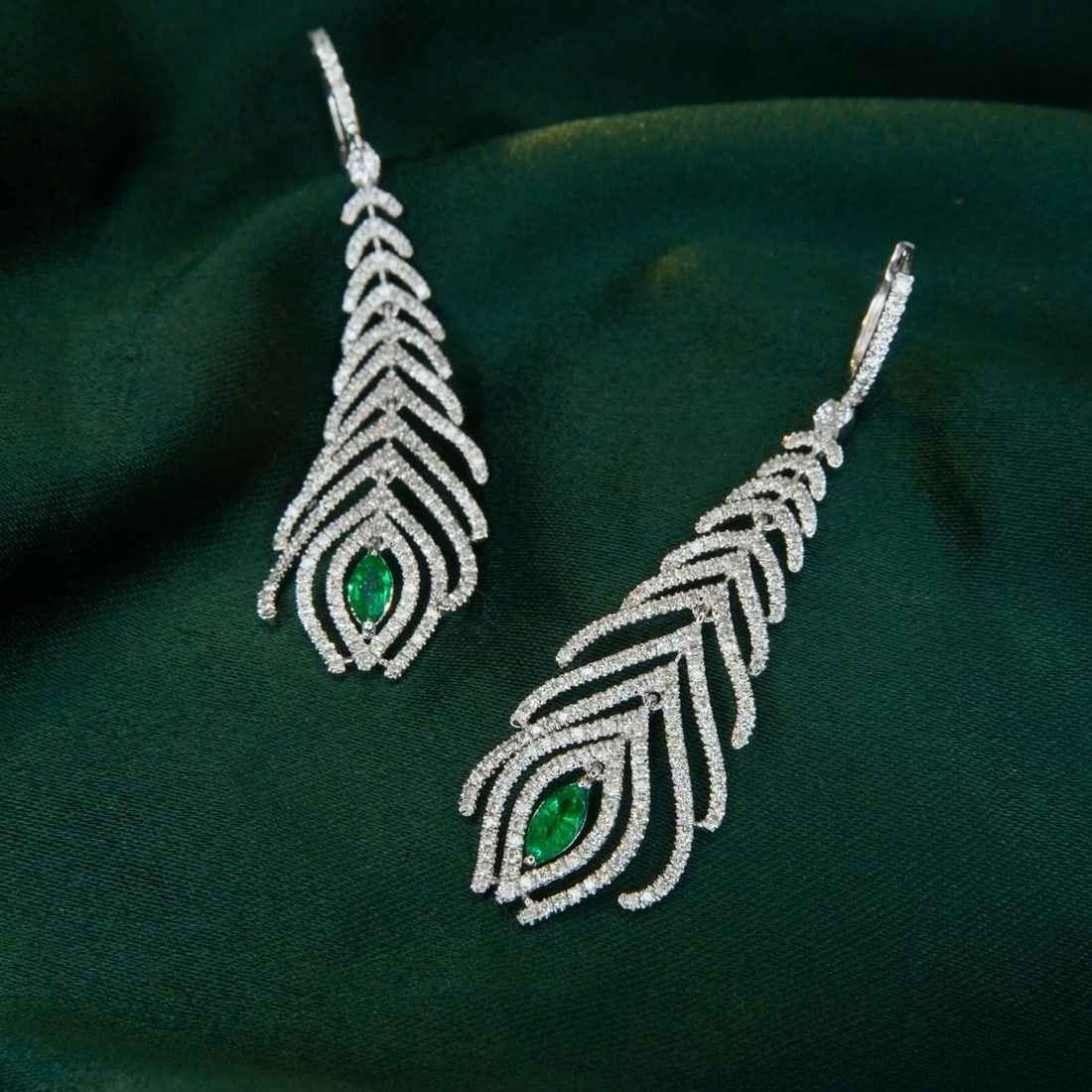 14k Gold 1.66 Ctw Natural Emerald & Diamond Earrings: Ref:231180059 // gold content:14k gold // main gemstone:emerald // shape:marquise // carat weight:0. 32ct // color:green // treatment:natural // // adjacent gemstone 2 : diamond // shape:round //
