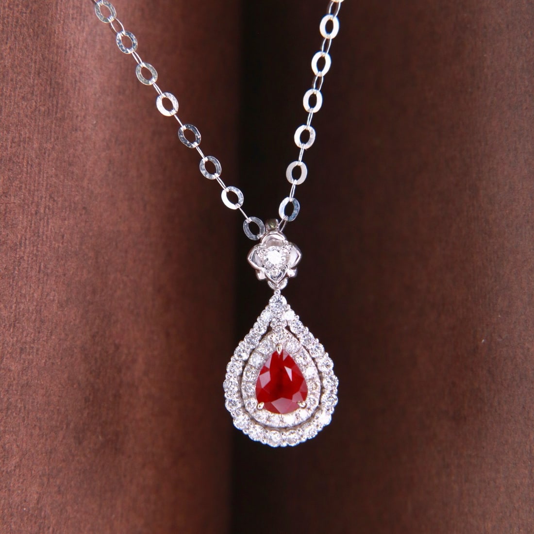 14k Gold 0.56 Ctw Natural Ruby & Diamond Necklace: Ref:231180083 // gold content:14k gold // main gemstone:ruby // shape:pear // carat weight:0. 35ct // color:pigeonblood red // treatment:natural // // adjacent gemstone 2 : diamond // shape:round // c