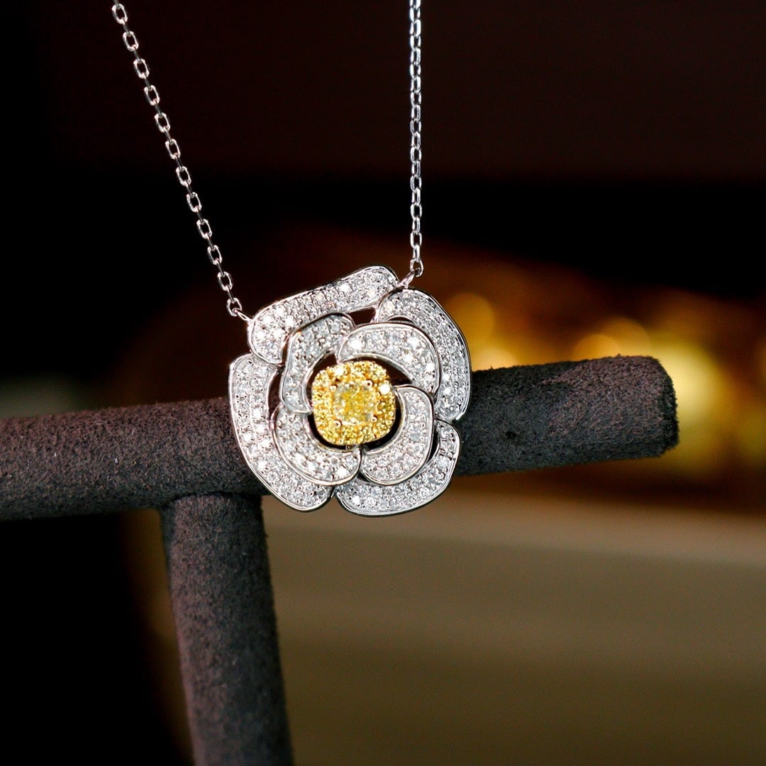 14k Gold 0.6 Ct Natural Color Diamond & Flowers Necklace: Ref:231180105 // gold content:14k gold // main gemstone:diamond // shape:multiple // carat weight:0. 6ct // clarity grade:vs-si // color:color // treatment:natural // Condition: New Low Estimate: