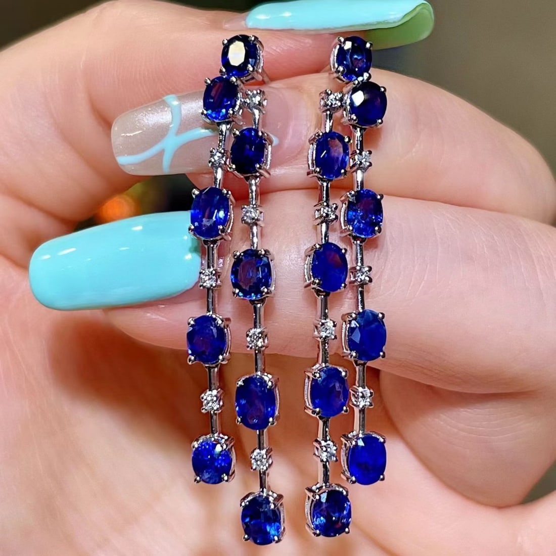 14k Gold 6.14 Ctw Natural Sapphire & Diamond Earrings: Ref:231180140 // gold content:14k gold // main gemstone:sapphire // shape:oval // carat weight:6. 00ct // color:blue // treatment:natural // // adjacent gemstone 2 : diamond // shape:round // carat