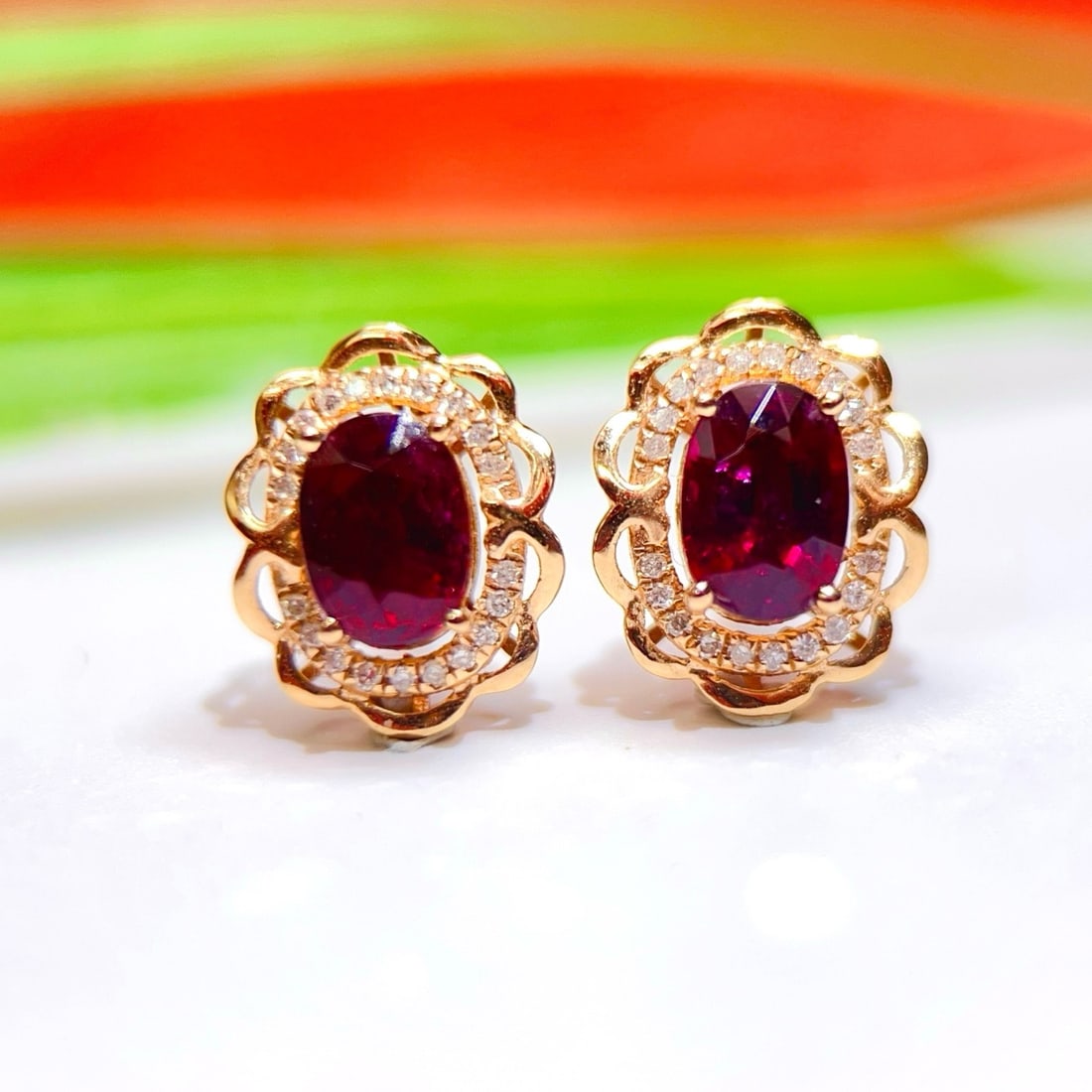 14k Gold 1.42 Ctw Natural Tourmaline & Diamond Earrings: Ref:231180153 // gold content:14k gold // main gemstone:tourmaline // shape:oval // carat weight:1. 3ct // color:red // treatment:natural // // adjacent gemstone 2 : diamond // number of stones:40 // 