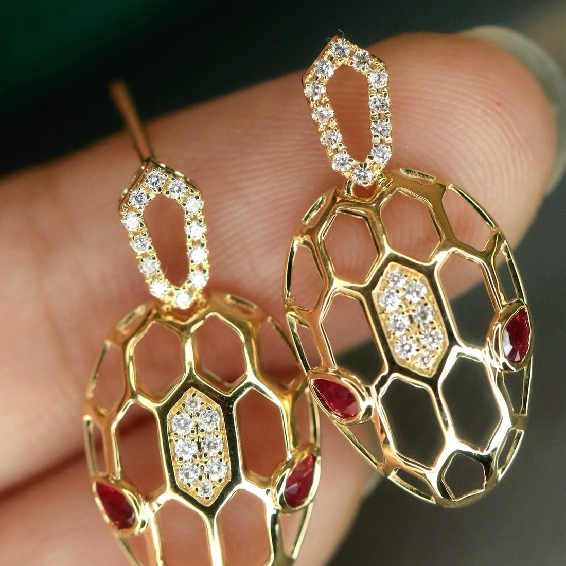 14k Gold 0.54 Ctw Natural Ruby & Diamond Earrings: Ref:231180162 // gold content:14k gold // main gemstone:ruby // shape:pear // carat weight:0. 38ct // color:red // treatment:natural // // adjacent gemstone 2 : diamond // shape:round // carat