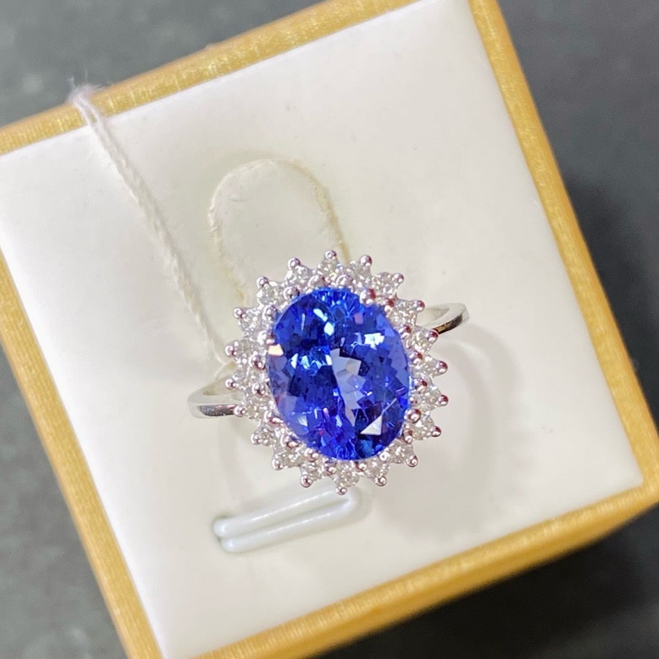 14k Gold 3.01 Ctw Natural Tanzanite & Diamond Ring: Ref:231180167 // gold content:14k gold // ring size:7. 25us // // main gemstone:tanzanite // shape:oval // carat weight:2. 71ct // color:blue // treatment:natural // // adjacent gemstone 2 : diamond