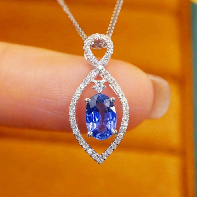 14k Gold 1.15 Ctw Natural Sapphire & Diamond Pendant( Without Chain ): Ref:231180168 // gold content:14k gold // main gemstone:sapphire // shape:oval // carat weight:1. 00ct // color:blue // treatment:natural // // adjacent gemstone 2 : diamond // number of stones:49 //