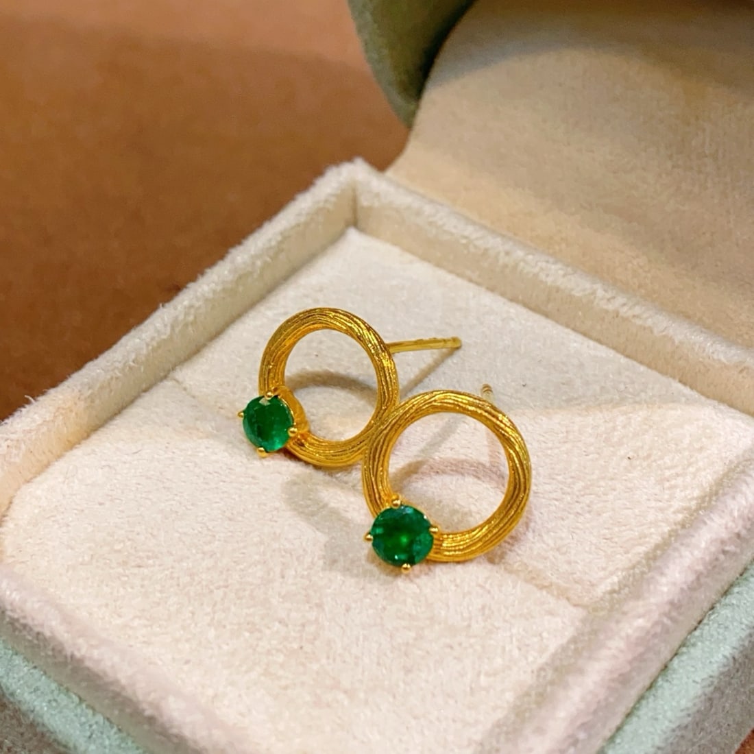 14k Gold 0.6 Ct Natural Emerald Earrings: Ref:231180173 // gold content:14k gold // main gemstone:emerald // shape:round // carat weight:0. 6ct // color:green // treatment:natural // cut grade:g // Condition: New Low Estimate: 12000.00 High