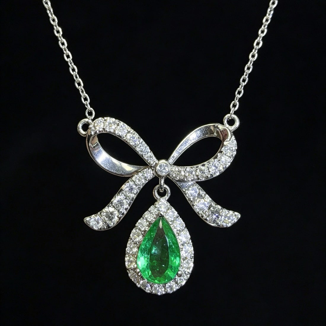 14k Gold 0.81 Ctw Natural Emerald & Diamond Necklace: Ref:231180175 // gold content:14k gold // main gemstone:emerald // shape:pear // carat weight:0. 4ct // color:green // treatment:natural // // adjacent gemstone 2 : diamond // shape:round // carat