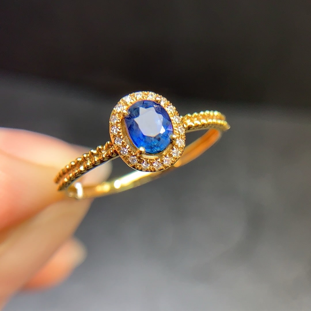 14k Gold 0.6 Ct Natural Sapphire & Diamond Ring: Ref:231180182 // gold content:14k gold // ring size:7. 25us // // main gemstone:sapphire // shape:oval // carat weight:0. 6ct // color:blue // treatment:natural // // adjacent gemstone 2 : diamond //