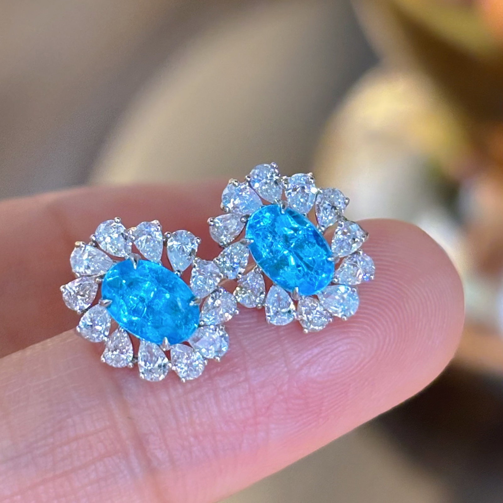 14k Gold 2 Ctw Natural Paraiba Tourmaline & Diamond Earrings: Ref:231180191 // gold content:14k gold // main gemstone:paraiba tourmaline // shape:oval // carat weight:1ct // color:neon blue // treatment:natural // // adjacent gemstone 2 : diamond // shape:pear