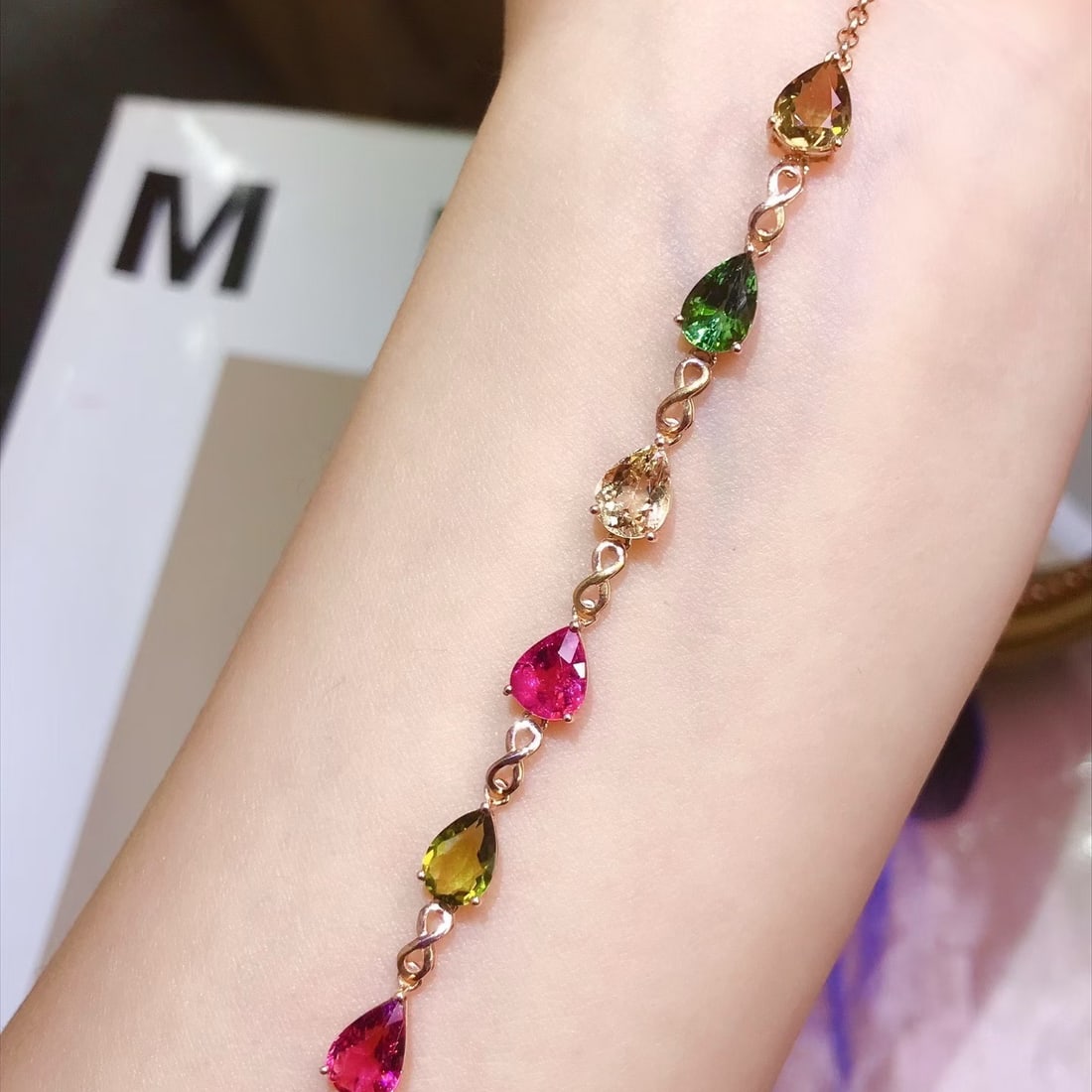 14k Gold 4 Ct Natural Tourmaline Bracelet: Ref:231180208 // gold content:14k gold // main gemstone:tourmaline // shape:pear // carat weight:4ct // color:color // treatment:natural // Condition: New Low Estimate: 4000.00 High Estimate: 5900.00