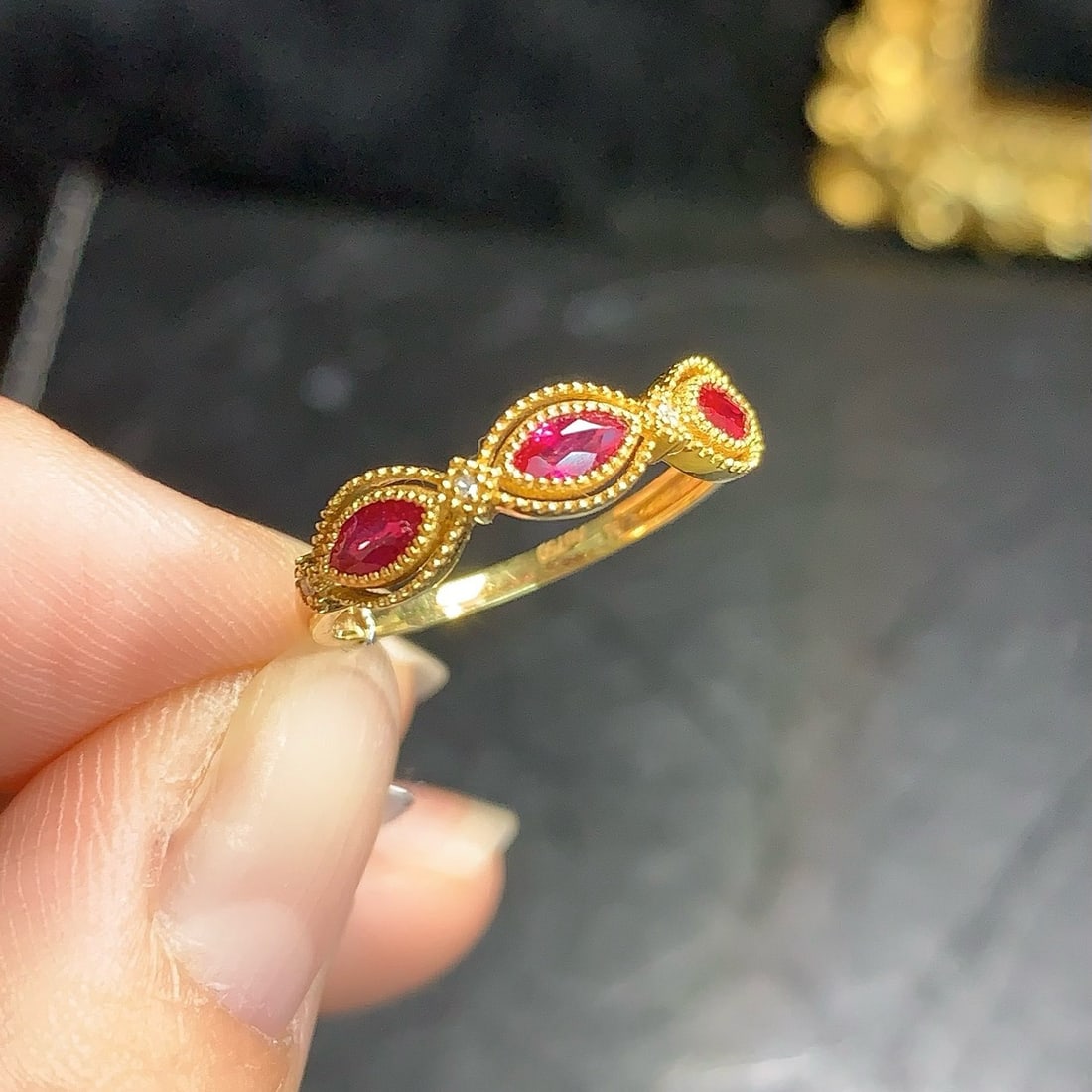 14k Gold 0.55 Ct Natural Ruby & Diamond Ring: Ref:231180226 // gold content:14k gold // ring size:7. 25us // // main gemstone:ruby // shape:marquise // carat weight:0. 55ct // color:red // treatment:natural // // adjacent gemstone 2 : diamond //