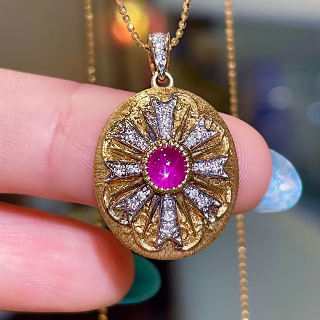 14k Gold 0.98 Ctw Natural Star Ruby & Diamond Pendant( Without Chain ): Ref:231180250 // gold content:14k gold // main gemstone:star ruby // shape:oval // carat weight:0. 83ct // color:red // treatment:natural // // adjacent gemstone 2 : diamond // shape:round // carat